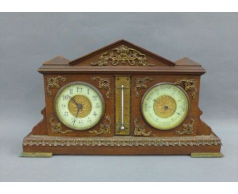 Early 20th century French oak cased clock and barometer, with architectural top, brass thermometer to centre and plinth base,