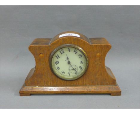 Art Nouveau oak cased mantle clock, the enamel dial with Arabic numerals and subsidiary seconds dial, 12cm high 