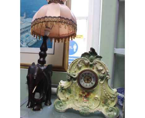 A WOODEN ELEPHANT TABLE LAMP and a green porcelain mantel clock 