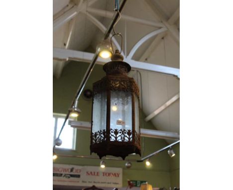 A MIDDLE EASTERN DESIGN METAL CASED HANGING LANTERN 
