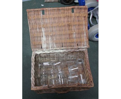 A WOVEN WICKER HAMPER CONTAINING GLASSES VARIOUS 
