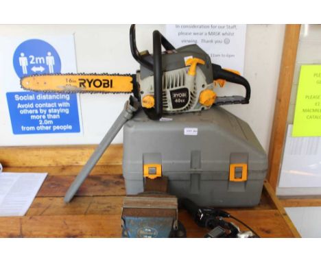 A CASED RYOBI CHAINSAW 