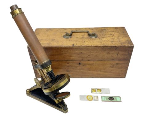 Late 19th/early 20th century brass monocular microscope by R. & J. Beck London No.6219, the cast triangular base with adjusta