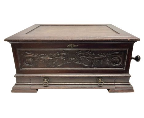 Late 19th century large Stella mahogany cased phonograph with carved front panel and base drawer containing twenty-eight 44cm