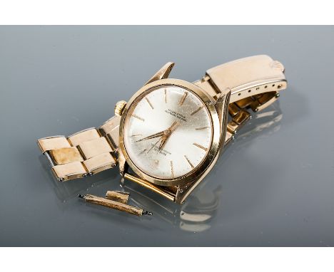 GENTLEMAN'S NINE CARAT GOLD ROLEX OYSTER PERPETUAL CHRONOMETER
1951, the dial with gold baton hour markers, case numbered 100