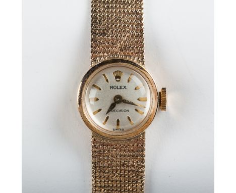 LADY'S NINE CARAT GOLD ROLEX PRECISION WRISTWATCH WITH GOLD MESH STRAP
the silvered dial with baton hour markers, hallmarked 