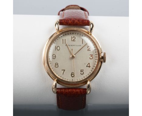 GENTLEMEN'S FOURTEEN CARAT GOLD IWC FOR TIFFANY & CO. WRISTWATCH
the silvered dial with stylised Arabic numerals, signed Inte