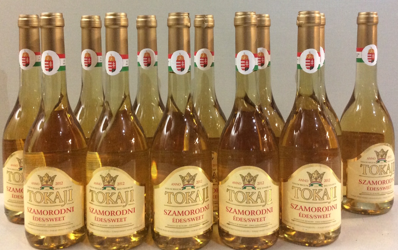 TOKAJI, A DOZEN BOTTLES OF HUNGARIAN SWEET WINE Each bearing a gold