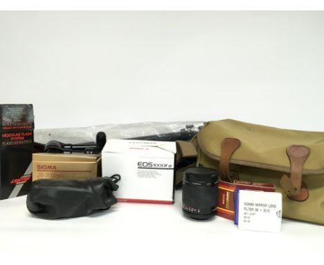Canon 1000OF camera, lens and accessories including a tripod stand