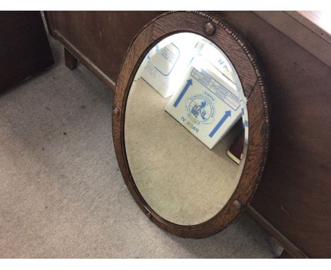 An oak framed oval mirror 79x59cm and an inlaid barometer 68cm Postage D- NO RESERVE