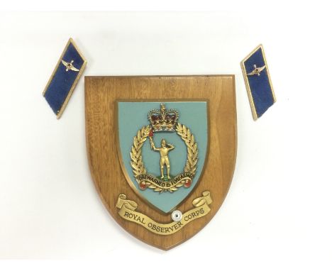 A Royal Observer Corps wooden plaque and a pair of epaulettes. Shipping category A.- NO RESERVE