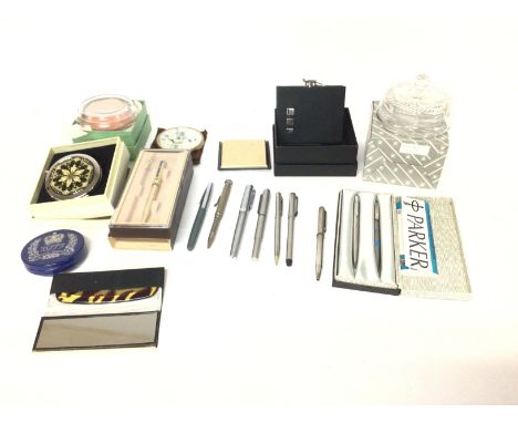 A collection of various pens and compacts and powder bowls. Including a hip flask. Postage D