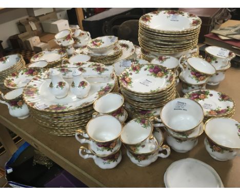 A twelve place setting Royal Albert dinner tea and coffee set with sets of graduating plated and bowls cups and saucers (a lo