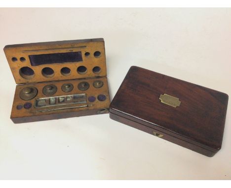A small vintage mahogany box with a brass label J.A Black Woolwich containing various small tools and a box containing variou