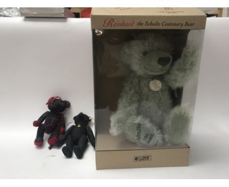 Four boxed Steiff bears, including the rice hard Schulte centenary bear, a 100 years of Steiff bear, a 1908 teddy bear, and a