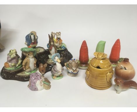 A collection of Beatrix potter Beswick figures with a naturalistic ceramic stand a condiment set AMD other oddments (a lot)