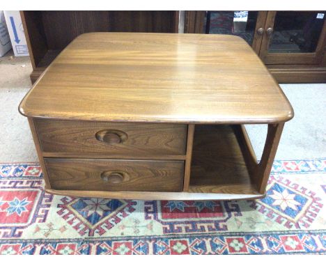 An Ercol Pandora coffee table. 80cm wide 40cm deep Postage D