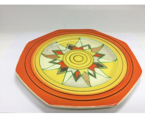 A Clarice Cliff Sun design octagonal plate, approx diameter 22cm. Shipping category D.