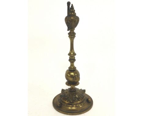 Unusual ornate brass table lighter, requires new flint, approximately 25cm tall.