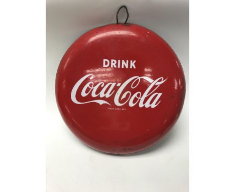 A mid 20th century vintage Coca Cola enamel button sign. Approx 36cm.