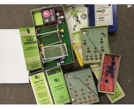 A collection of Subbuteo team players various, together with nets, balls, fence surrounds etc