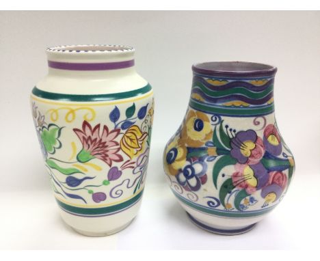 Two Poole vases including a Carter Stabler Adams example, tallest approx 22cm. Shipping category D.