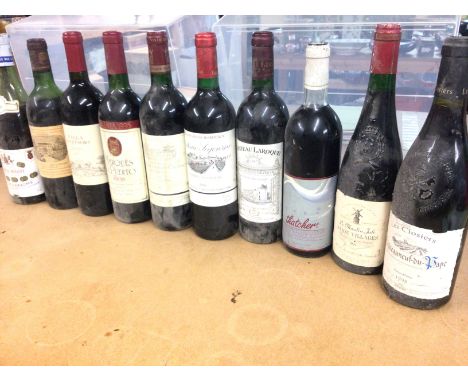 A collection of 10 assorted bottles of red wine including a 1998 Chateauneuf du pape. Postage D