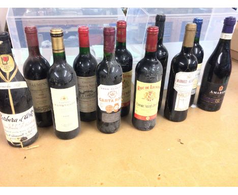 A collection of 11 bottles of red wine including 1996 Chateau Ramondade . Postage D