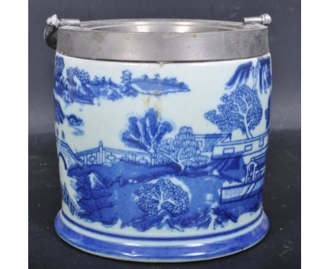 A Victorian revival Chinese style blue and white ceramic biscuit barrel with silver plated mounts. The biscuit barrel having 