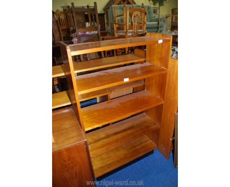 A four shelf open back bookcase, 31 1/2'' x 53'' x 11 1/2''.