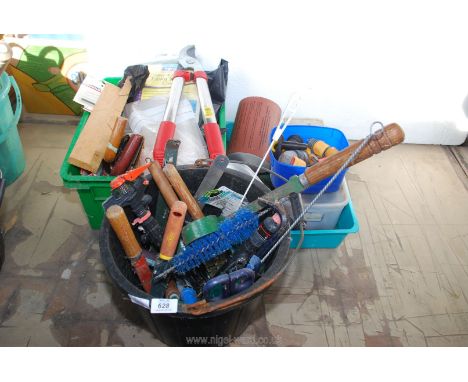 A quantity of Hozelock fittings, loppers and a bucket of various hand tools