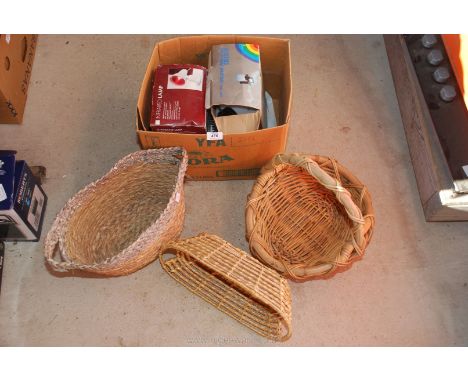 Wicker baskets, heat lamp and spray gun.