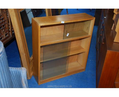 Light oak glass fronted bookcase