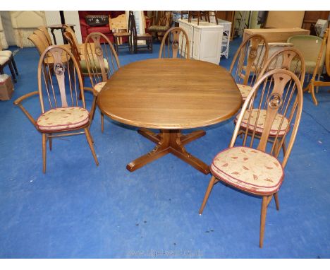 Ercol pull out dining table 65 1/2" fully extended x 45" wide on single pedestal base with four supports and set of six dinin