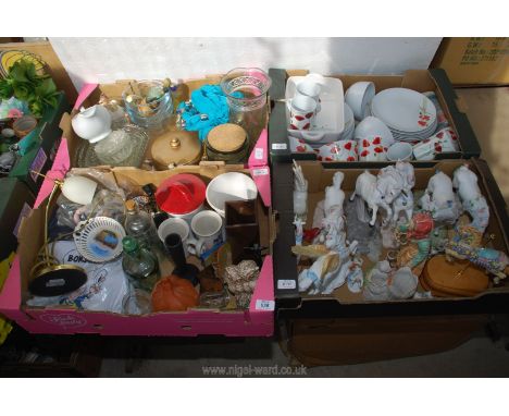 Four boxes of dinner china, unicorn ornaments, table lamp etc.