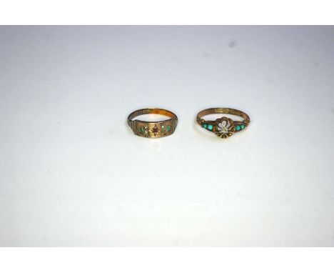 Two antique gold rings. The first 9ct rose gold set with central rose cut diamond with turquoise cabochon shoulders together 