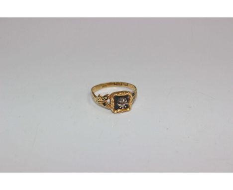An 18ct gold Victorian memorial ring,  black enamel square panel with central claw set rose cut diamond and black enamel shou