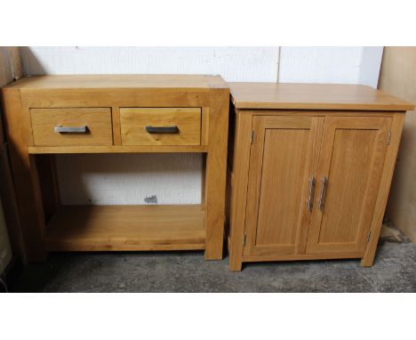 A light oak console table (h: 80cm w: 90cm d: 35cm), a light oak cupboard (h: 77cm w: 71cm d: 46cm) and a mirror. 