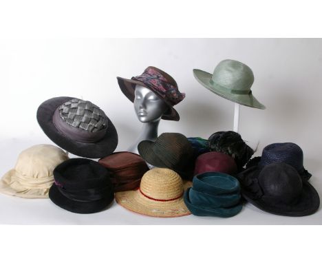 An early 20th Century grey velvet and silk hat, a 1930s brown straw hat with  silk ribbon decoration, a wide brimmed fine str