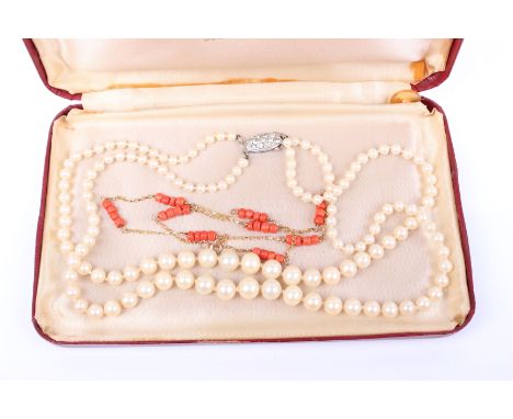 A 9ct gold and red coral necklace together with a string of synthetic pearls by Rosita. 