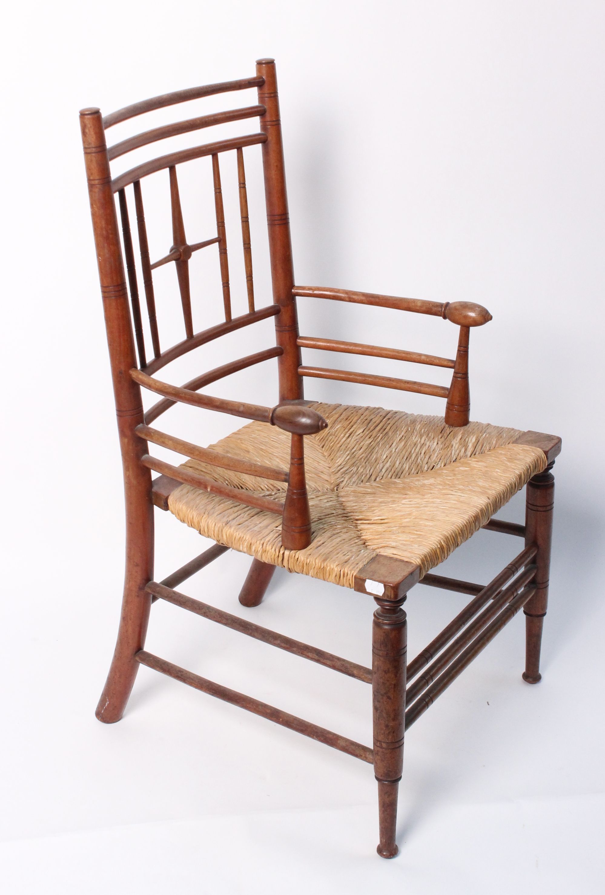 An Arts and Crafts Sussex chair with rush seat after a design by Ford ...