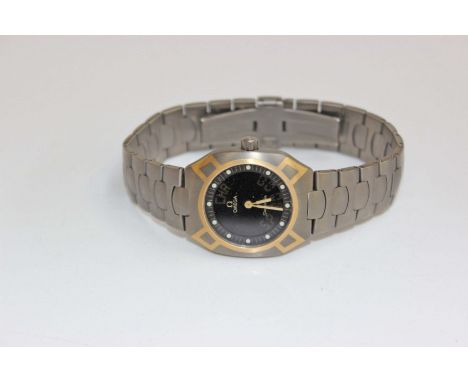 A Gentleman's Omega seamaster watch. Quartz movement on a bimetallic titanium bracelet. With original red leather box and rec