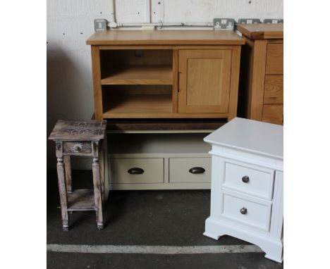 A painted wooden side unit, a light oak side unit, with a two drawer chest and an occasional table             