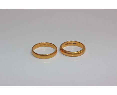 Two 22ct gold wedding bands 10.8g . Size R/N