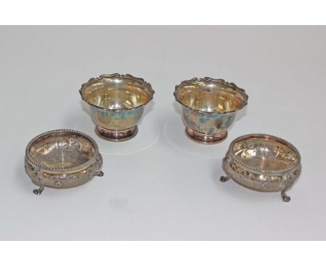 Two pairs of silver salts, the first raised on three feet with chased and engraved floral decoration by John Tongue Birmingha
