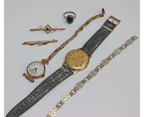 A collection of watches and jewellery to include a 9ct gold watch, white enamel face on a yellow metal strap, a yellow metal 
