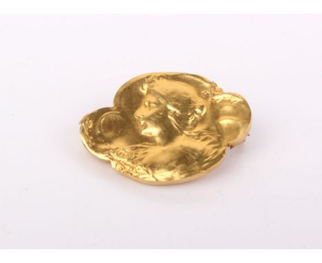 A 18ct gold early 20th century French Art Nouveau brooch, depicting the portrait of a lady signed Diolot. 1.7g