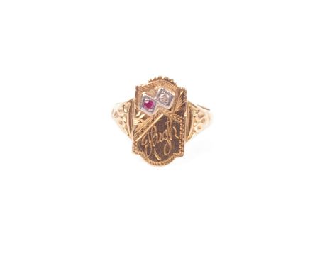 An 18ct gold plaque ring, collet set with with small free cut ruby and old cut diamond. 2.7g Size I