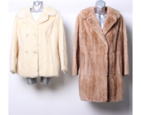 A late 1950s three quarter length pale musquash coat; a 1960s  jasmine pale mink jacket ; two reptile skin clutch style handb
