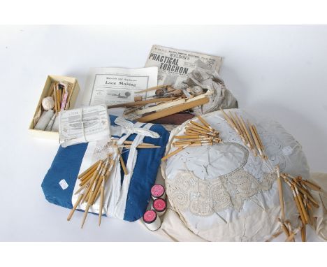 Two lace pillows; a quantity of modern wooden bobbins, Knox's linen thread, a quantity of bone tatting tools, a crochet hook 